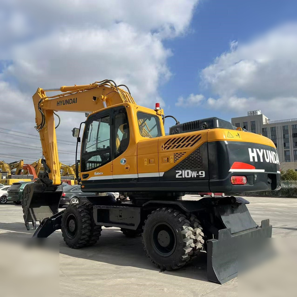 HYUNDAI ROBEX 210W-9 - Riteņu ekskavators: foto 1 HYUNDAI ROBEX 210W-9 - Riteņu ekskavators: foto 1