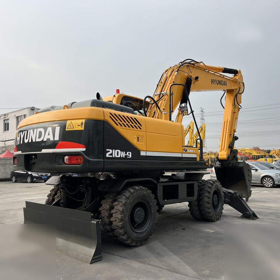 HYUNDAI ROBEX 210W-9 - Riteņu ekskavators: foto 3 HYUNDAI ROBEX 210W-9 - Riteņu ekskavators: foto 3