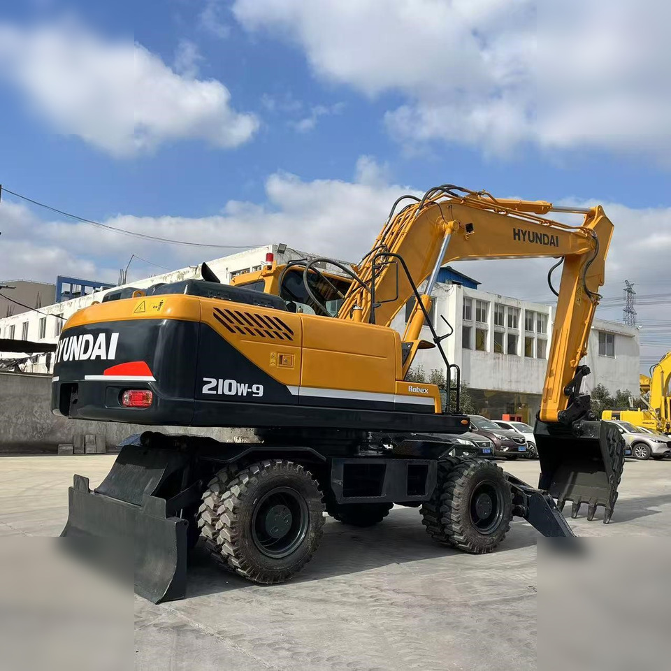 HYUNDAI ROBEX 210W-9 - Riteņu ekskavators: foto 5 HYUNDAI ROBEX 210W-9 - Riteņu ekskavators: foto 5
