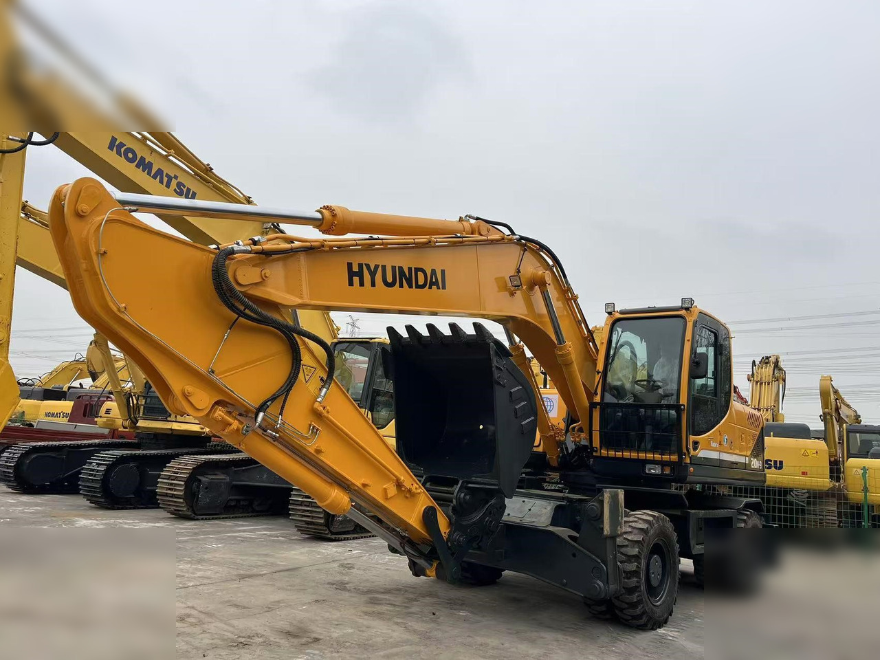 HYUNDAI ROBEX 210W-9S - Riteņu ekskavators: foto 4 HYUNDAI ROBEX 210W-9S - Riteņu ekskavators: foto 4