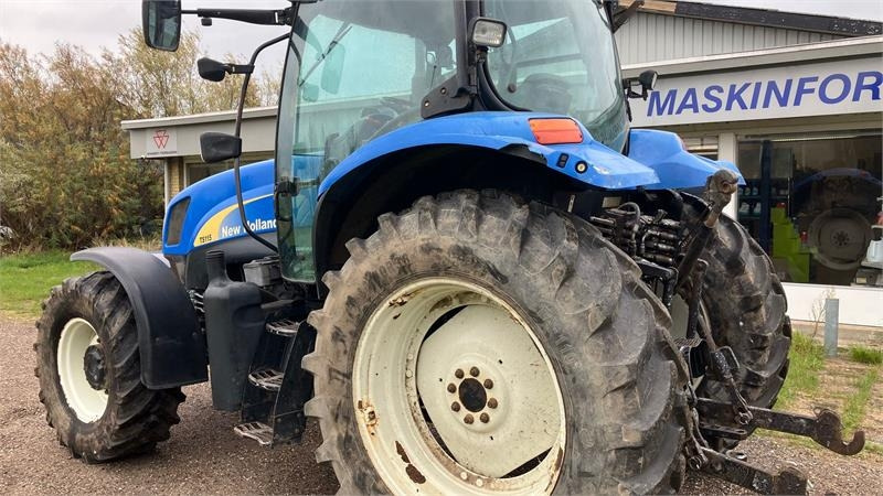 New Holland TS 115 A - Traktors: foto 3 New Holland TS 115 A - Traktors: foto 3