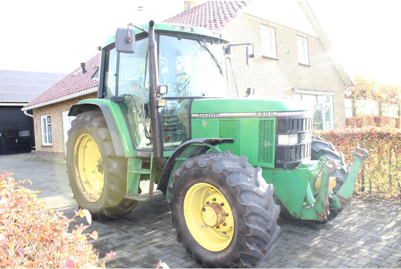 John Deere 6200 - Traktors: foto 1 John Deere 6200 - Traktors: foto 1