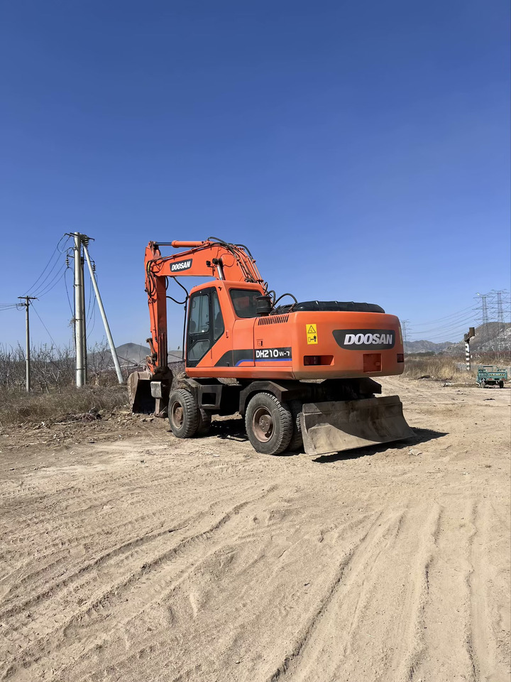 DOOSAN 210w - Riteņu ekskavators: foto 5 DOOSAN 210w - Riteņu ekskavators: foto 5