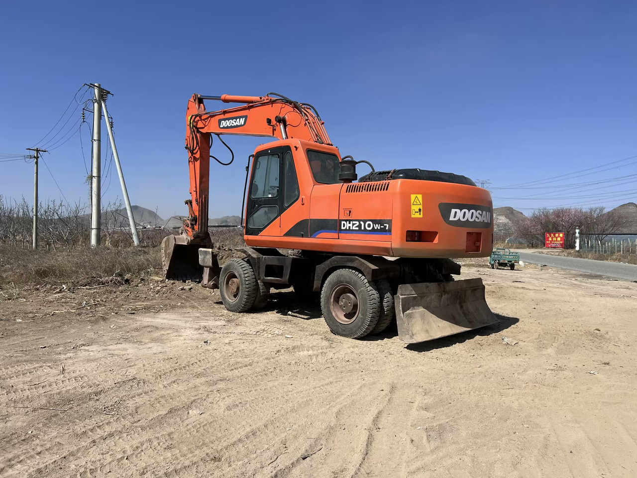 DOOSAN 210w - Riteņu ekskavators: foto 3 DOOSAN 210w - Riteņu ekskavators: foto 3