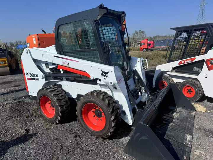 Skid Steer Loader Bobcat S550 Original Wheel Loader in Good Condition on Sale Bobcat 550 - Kompaktiekrāvējs: foto 5 Skid Steer Loader Bobcat S550 Original Wheel Loader in Good Condition on Sale Bobcat 550 - Kompaktiekrāvējs: foto 5