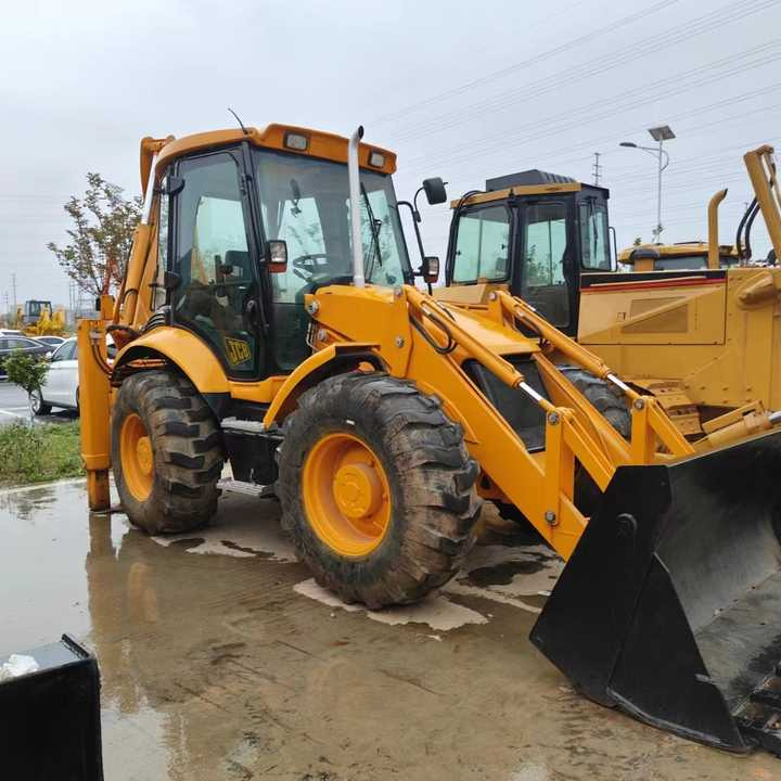 Used Backhoe Loader JCB 4x4 Wheel 20 Ton Backhoe Loader JCB 3CX 4CX Backhoe Excavator Loader Fpr Sale - Ekskavators-iekrāvējs: foto 3 Used Backhoe Loader JCB 4x4 Wheel 20 Ton Backhoe Loader JCB 3CX 4CX Backhoe Excavator Loader Fpr Sale - Ekskavators-iekrāvējs: foto 3