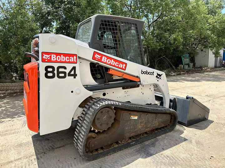 Used Heavy Construction Equipment Crawler bobcat T864 Second Hand Smaller Skid Steers Used Machine for Sale - Kompaktiekrāvējs: foto 2 Used Heavy Construction Equipment Crawler bobcat T864 Second Hand Smaller Skid Steers Used Machine for Sale - Kompaktiekrāvējs: foto 2