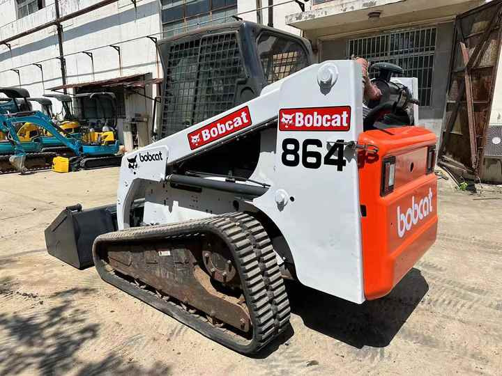 Used Heavy Construction Equipment Crawler bobcat T864 Second Hand Smaller Skid Steers Used Machine for Sale - Kompaktiekrāvējs: foto 4 Used Heavy Construction Equipment Crawler bobcat T864 Second Hand Smaller Skid Steers Used Machine for Sale - Kompaktiekrāvējs: foto 4