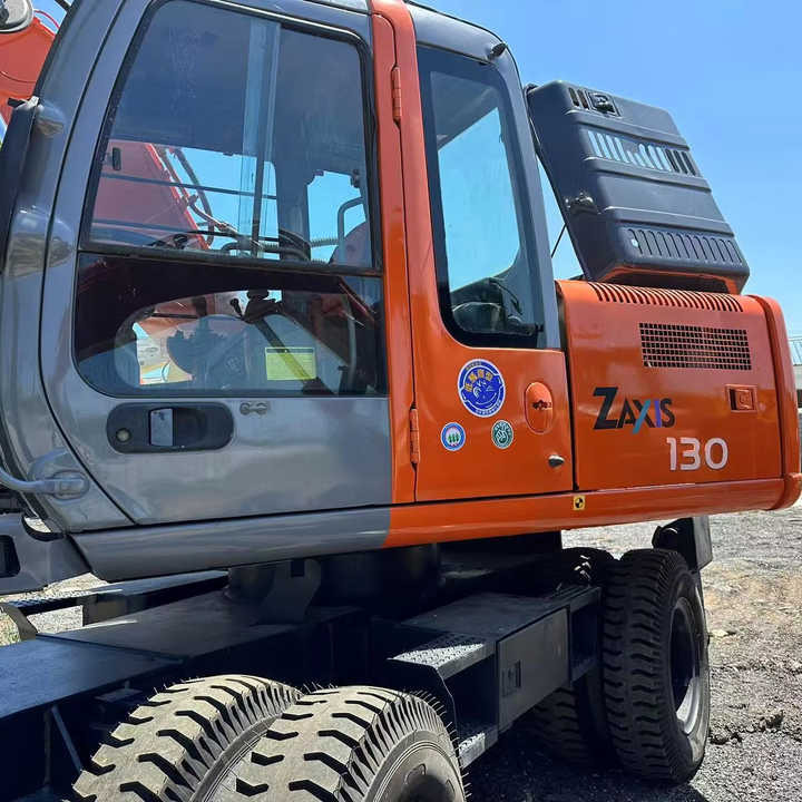 Used Wheel Excavator Hitachi ZX 130W Made in Japan 13ton Hitachi Zx130w Wheel Excavator Price Used Hitachi Zx130 Excavator SALE - Ekskavators: foto 1 Used Wheel Excavator Hitachi ZX 130W Made in Japan 13ton Hitachi Zx130w Wheel Excavator Price Used Hitachi Zx130 Excavator SALE - Ekskavators: foto 1