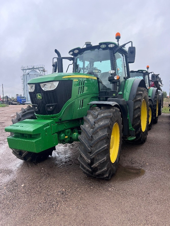 John Deere 6195M - Traktors: foto 1 John Deere 6195M - Traktors: foto 1
