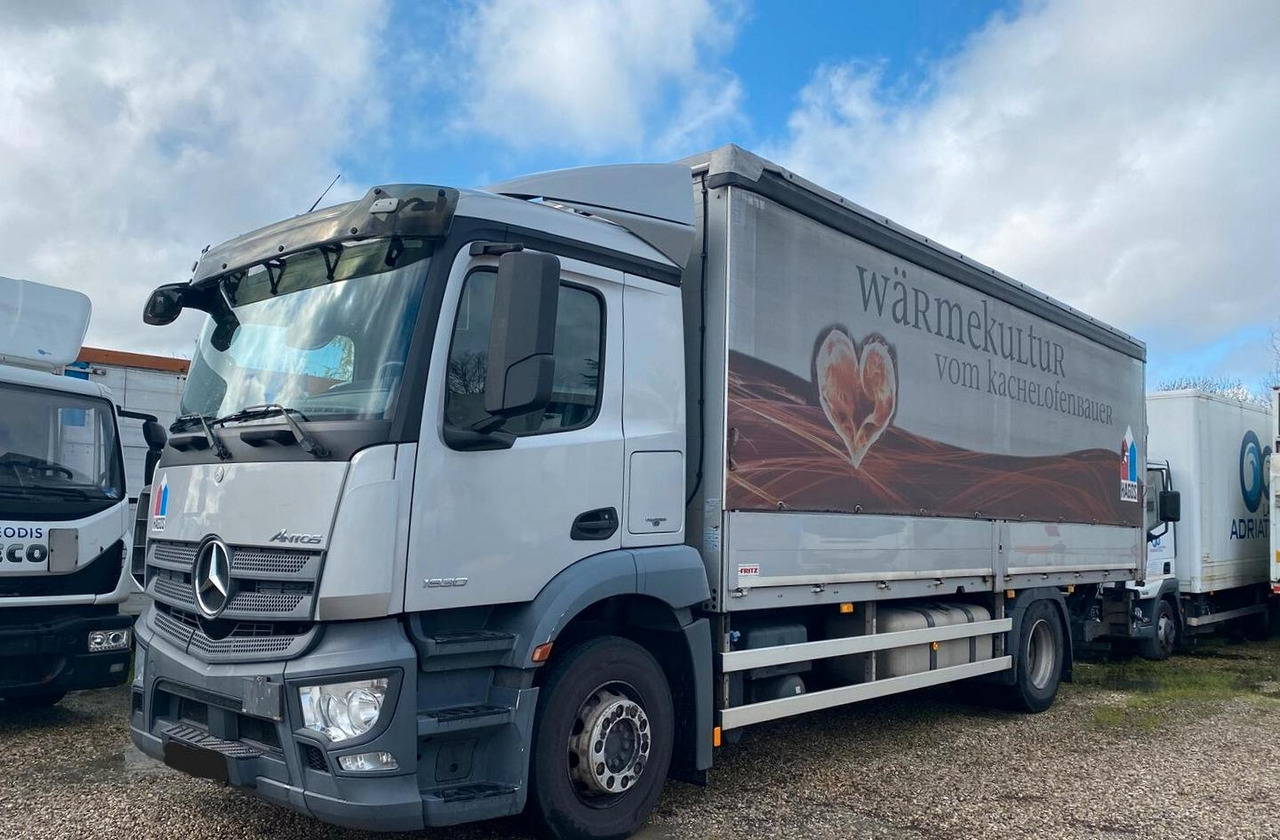 MERCEDES ANTOS 18.30 - Kravas automašīna ar tentu: foto 1 MERCEDES ANTOS 18.30 - Kravas automašīna ar tentu: foto 1