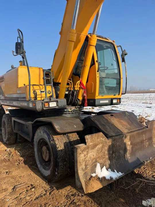 Used Korea Brand Original hyundai 210w-9 Wheel Excavator for Sale Used hyundai Wheel Excavator - Riteņu ekskavators: foto 2 Used Korea Brand Original hyundai 210w-9 Wheel Excavator for Sale Used hyundai Wheel Excavator - Riteņu ekskavators: foto 2