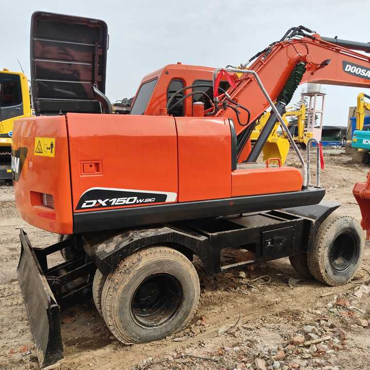 Used Original Doosan Dx150w-9 Wheel Excavator for Sale - Riteņu ekskavators: foto 3 Used Original Doosan Dx150w-9 Wheel Excavator for Sale - Riteņu ekskavators: foto 3