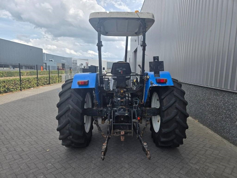 New Holland TL 90 A - Traktors: foto 4 New Holland TL 90 A - Traktors: foto 4