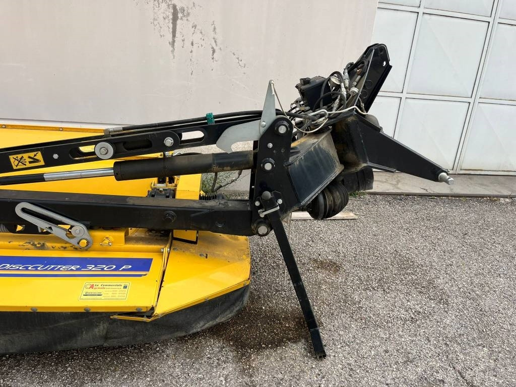 New Holland DISCOCUTTER 320 P - Pļāvējs: foto 1 New Holland DISCOCUTTER 320 P - Pļāvējs: foto 1