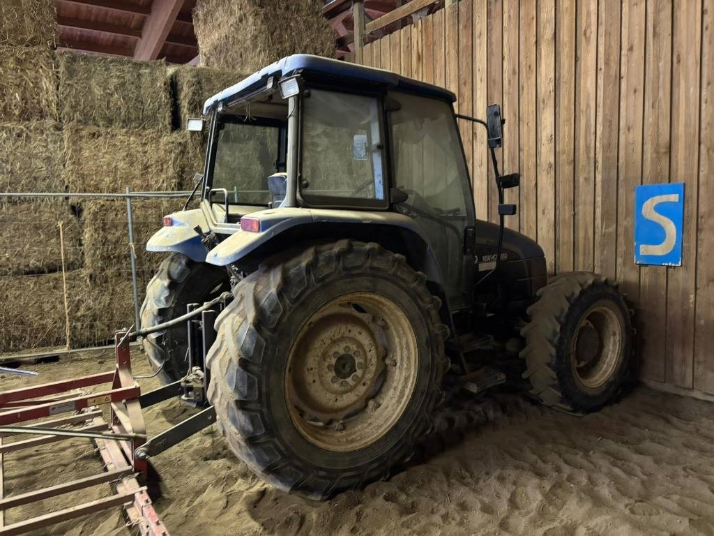 New Holland TL 90 - Traktors: foto 1 New Holland TL 90 - Traktors: foto 1