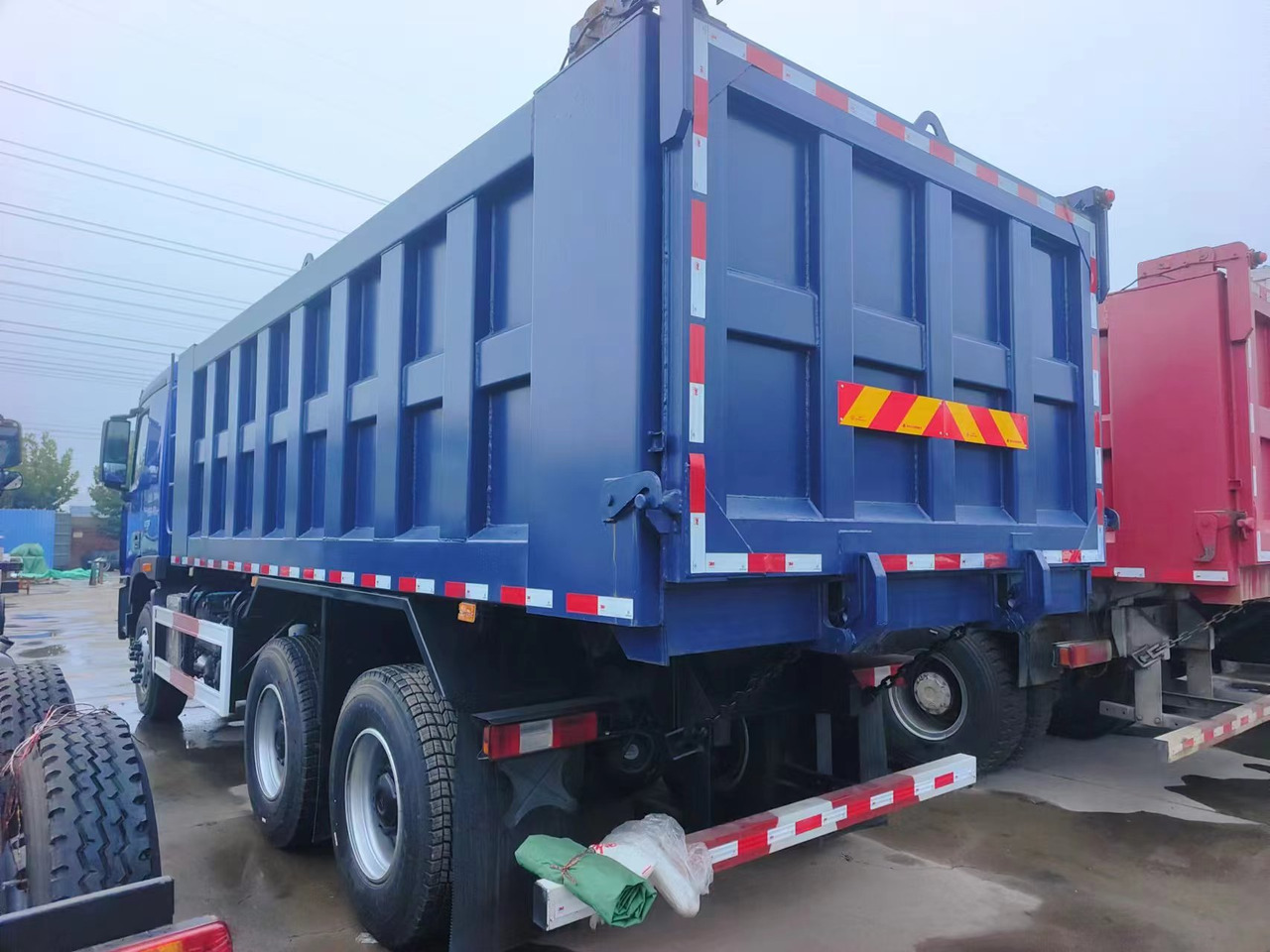 Auman Auman 6*4  dump truck - Kravas automašīna pašizgāzējs: foto 3 Auman Auman 6*4  dump truck - Kravas automašīna pašizgāzējs: foto 3