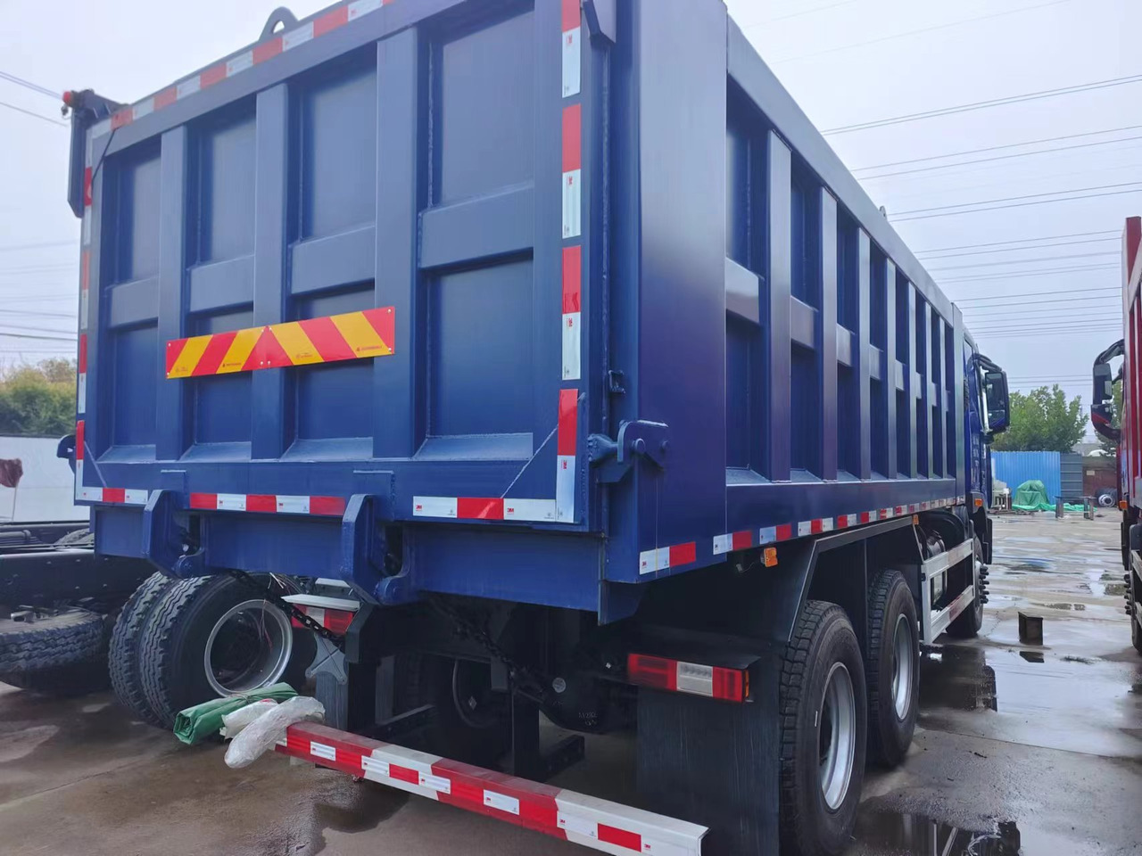Auman Auman 6*4  dump truck - Kravas automašīna pašizgāzējs: foto 4 Auman Auman 6*4  dump truck - Kravas automašīna pašizgāzējs: foto 4