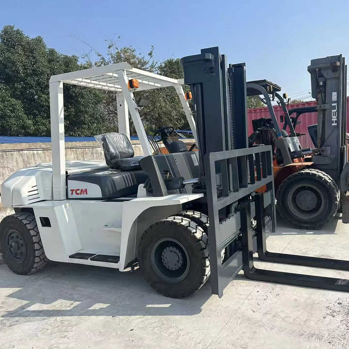 High Quality TCM 7 Ton with Hydraulic Distance Adjustment Used Forklift in Stock Used tcm Forklift 7 Ton Used tcm Fd70 Forklift - Autokrāvējs: foto 1 High Quality TCM 7 Ton with Hydraulic Distance Adjustment Used Forklift in Stock Used tcm Forklift 7 Ton Used tcm Fd70 Forklift - Autokrāvējs: foto 1