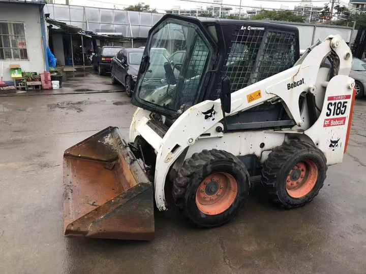 Used Bob Cat Bob Cat S185 Used Mini Skid Steer Wheel Loader Multifunctional Track Loaders Bobcat - Riteņu iekrāvējs: foto 3 Used Bob Cat Bob Cat S185 Used Mini Skid Steer Wheel Loader Multifunctional Track Loaders Bobcat - Riteņu iekrāvējs: foto 3