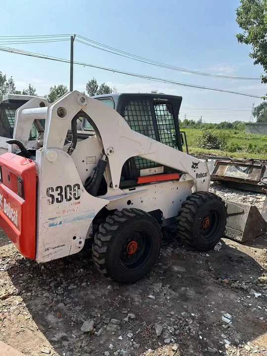 Used Bob Cat Bob Cat S300 Used Skid Steer Wheel Loader Multifunctional Track Loaders Bobcat - Riteņu iekrāvējs: foto 3 Used Bob Cat Bob Cat S300 Used Skid Steer Wheel Loader Multifunctional Track Loaders Bobcat - Riteņu iekrāvējs: foto 3