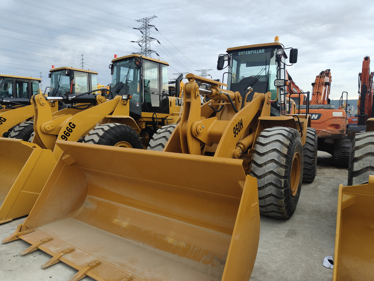 CATERPILLAR 950H - Riteņu iekrāvējs: foto 1 CATERPILLAR 950H - Riteņu iekrāvējs: foto 1