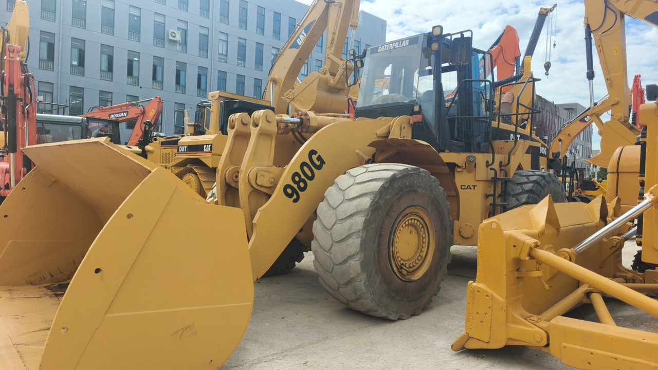 CATERPILLAR 980G - Riteņu iekrāvējs: foto 1 CATERPILLAR 980G - Riteņu iekrāvējs: foto 1