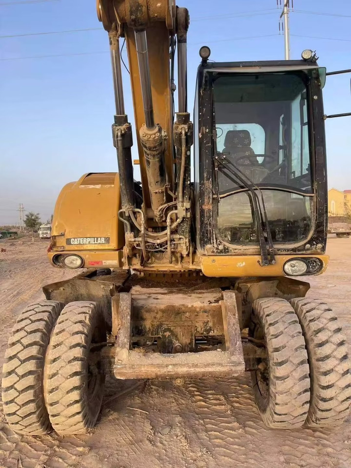 CATERPILLAR M315 - Riteņu ekskavators: foto 3 CATERPILLAR M315 - Riteņu ekskavators: foto 3