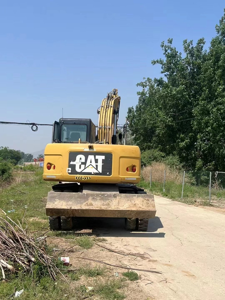 CATERPILLAR M317 - Riteņu ekskavators: foto 3 CATERPILLAR M317 - Riteņu ekskavators: foto 3