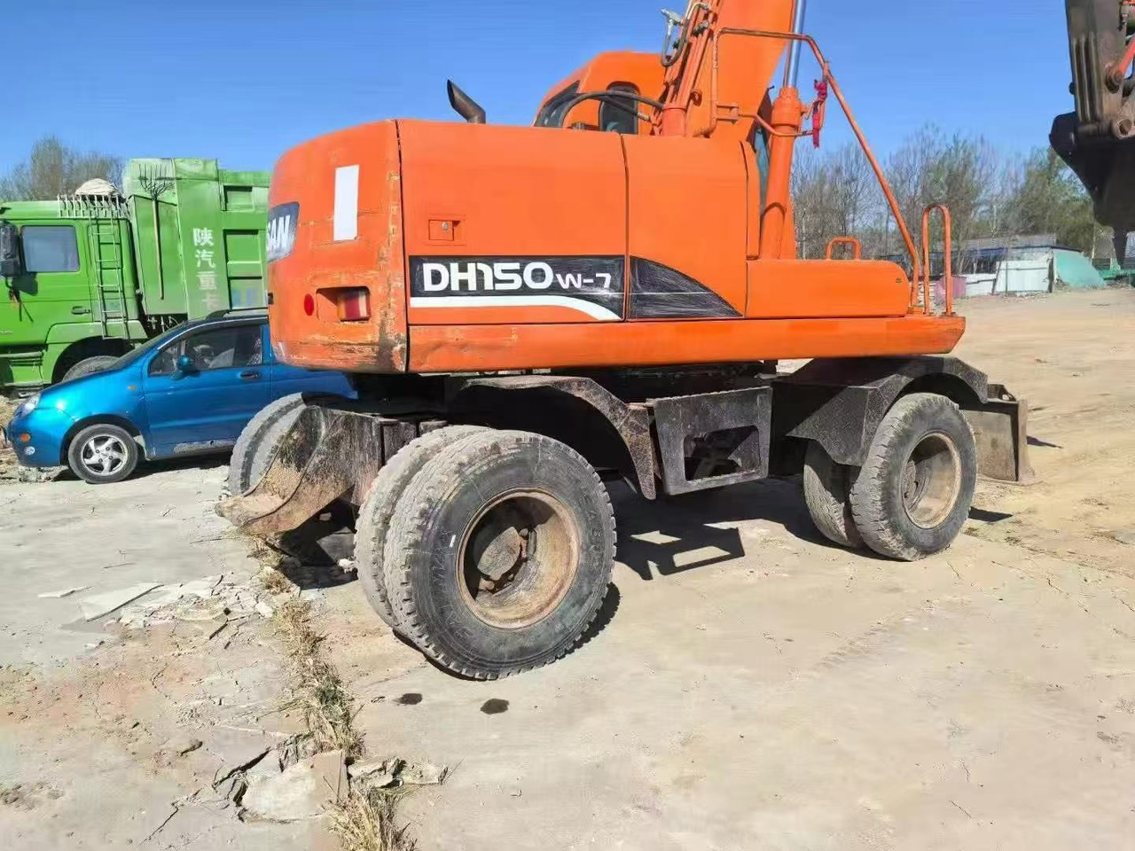 DOOSAN DH150W-7 - Riteņu ekskavators: foto 4 DOOSAN DH150W-7 - Riteņu ekskavators: foto 4