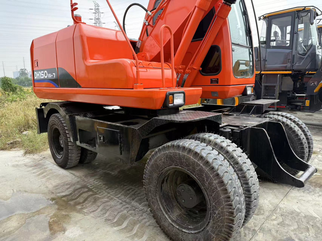 DOOSAN DH150W-7 - Riteņu ekskavators: foto 4 DOOSAN DH150W-7 - Riteņu ekskavators: foto 4
