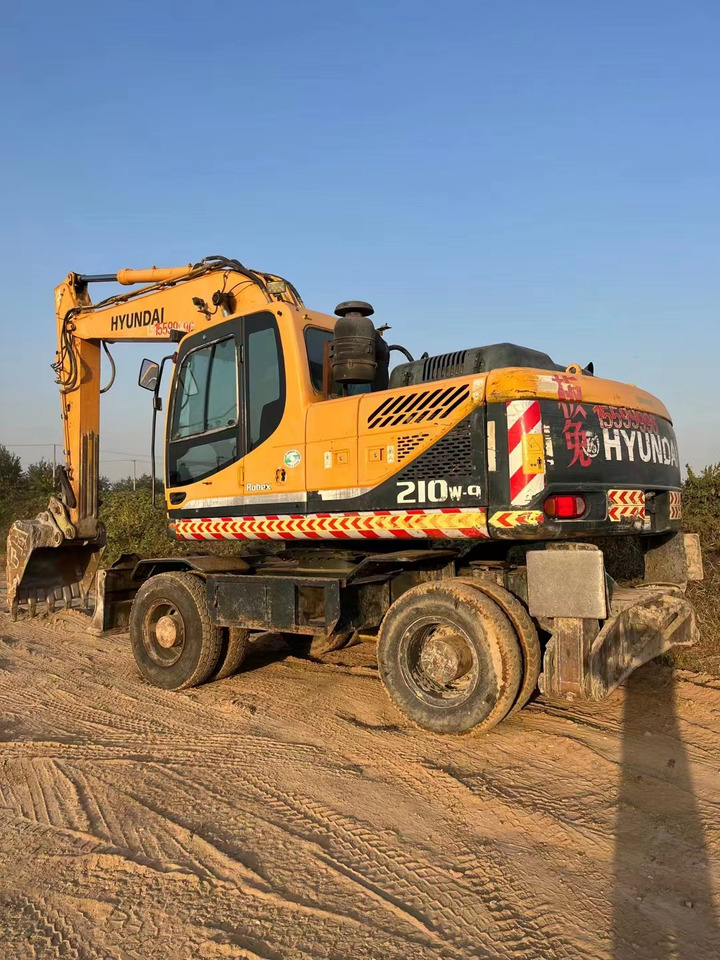 HYUNDAI R210W-9 - Riteņu ekskavators: foto 2 HYUNDAI R210W-9 - Riteņu ekskavators: foto 2
