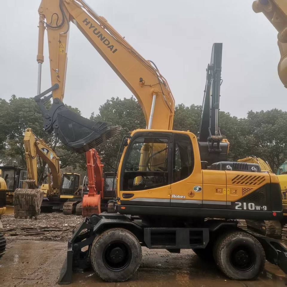 HYUNDAI R210W-9 - Riteņu ekskavators: foto 4 HYUNDAI R210W-9 - Riteņu ekskavators: foto 4