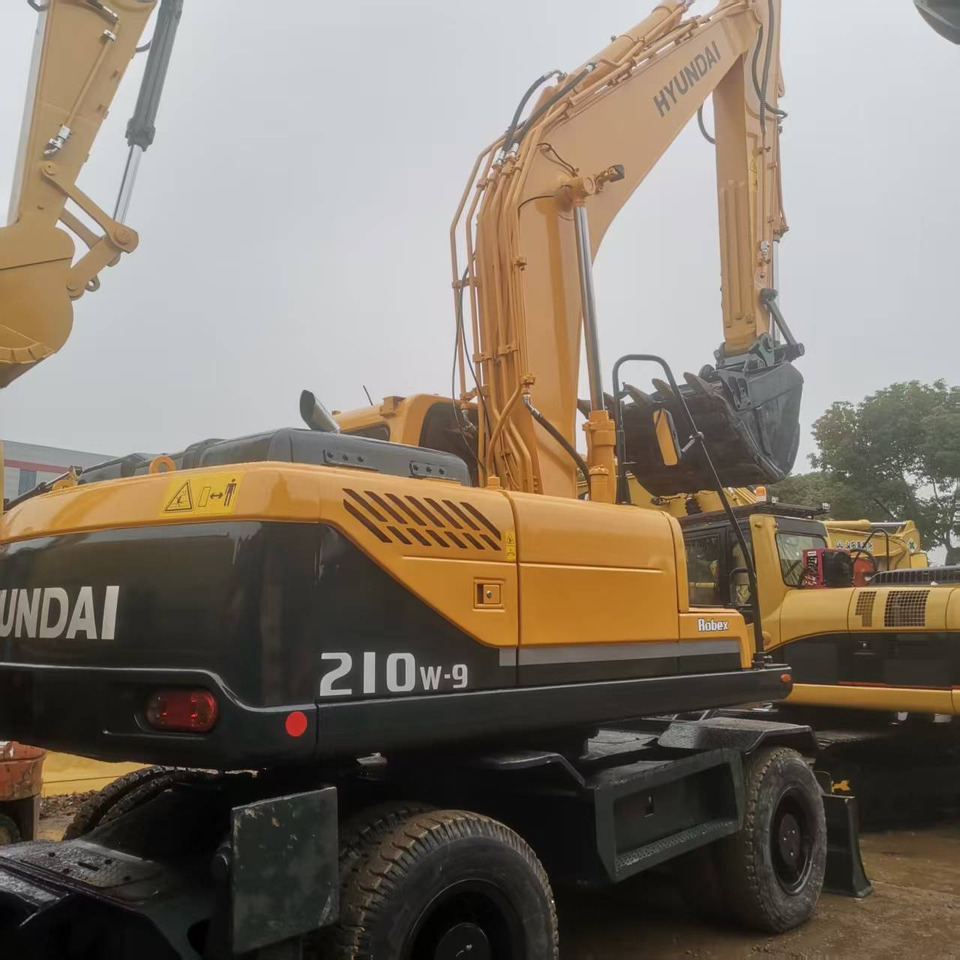 HYUNDAI R210W-9 - Riteņu ekskavators: foto 5 HYUNDAI R210W-9 - Riteņu ekskavators: foto 5