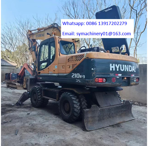 Hyundai R210W - Riteņu ekskavators: foto 1 Hyundai R210W - Riteņu ekskavators: foto 1