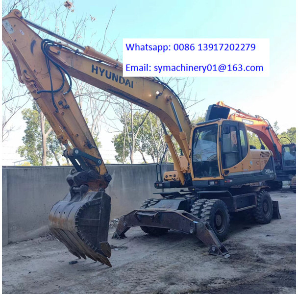 Hyundai R210W - Riteņu ekskavators: foto 2 Hyundai R210W - Riteņu ekskavators: foto 2