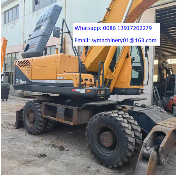 Hyundai R210W - Riteņu ekskavators: foto 4 Hyundai R210W - Riteņu ekskavators: foto 4