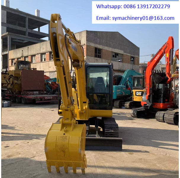 Komatsu PC56-7 - Mini-ekskavators: foto 5 Komatsu PC56-7 - Mini-ekskavators: foto 5