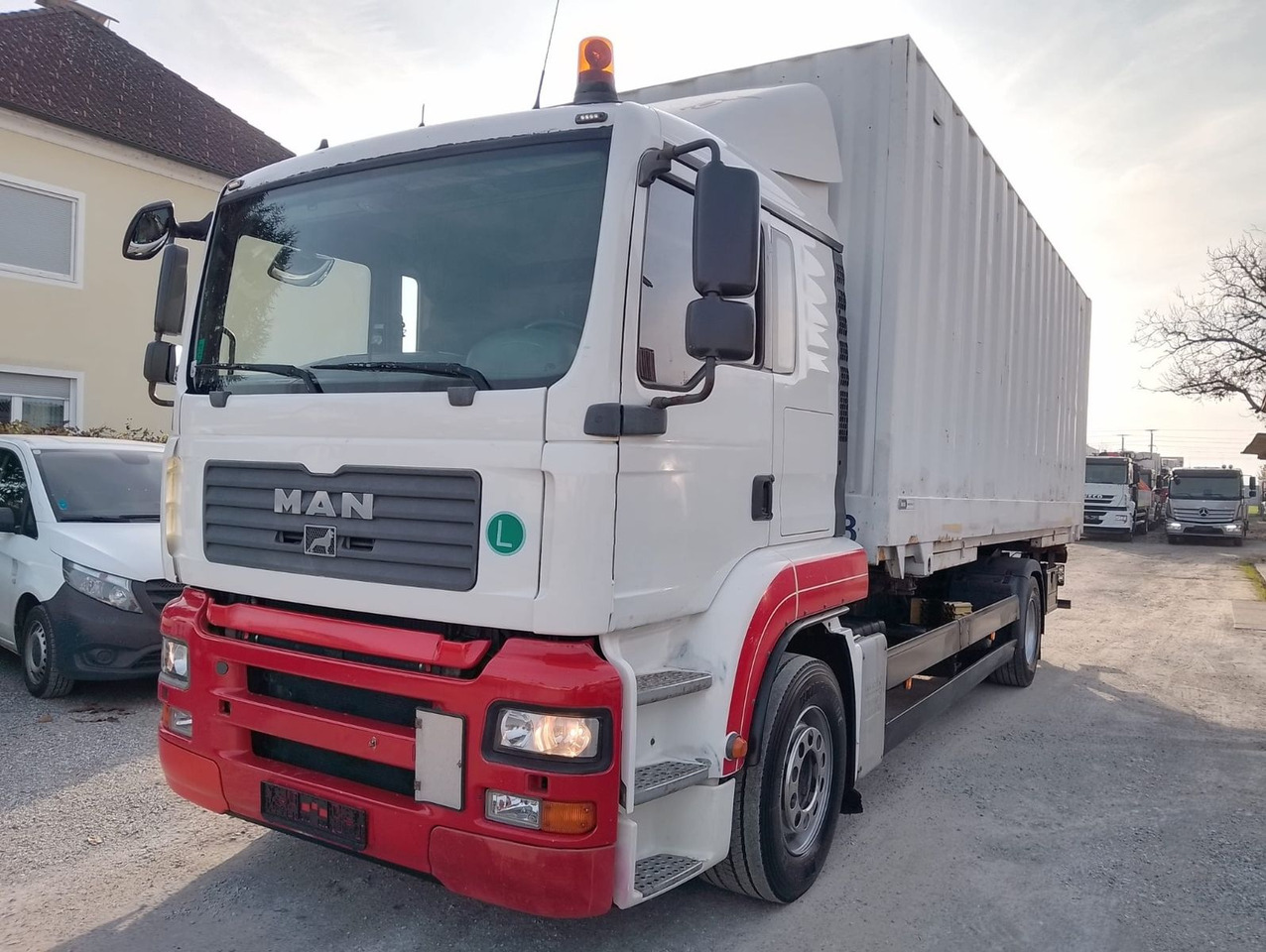 MAN TGA 18 320 - Konteineru vedējs/ Kravas automašīna ar noņemamā virsbūve: foto 1 MAN TGA 18 320 - Konteineru vedējs/ Kravas automašīna ar noņemamā virsbūve: foto 1