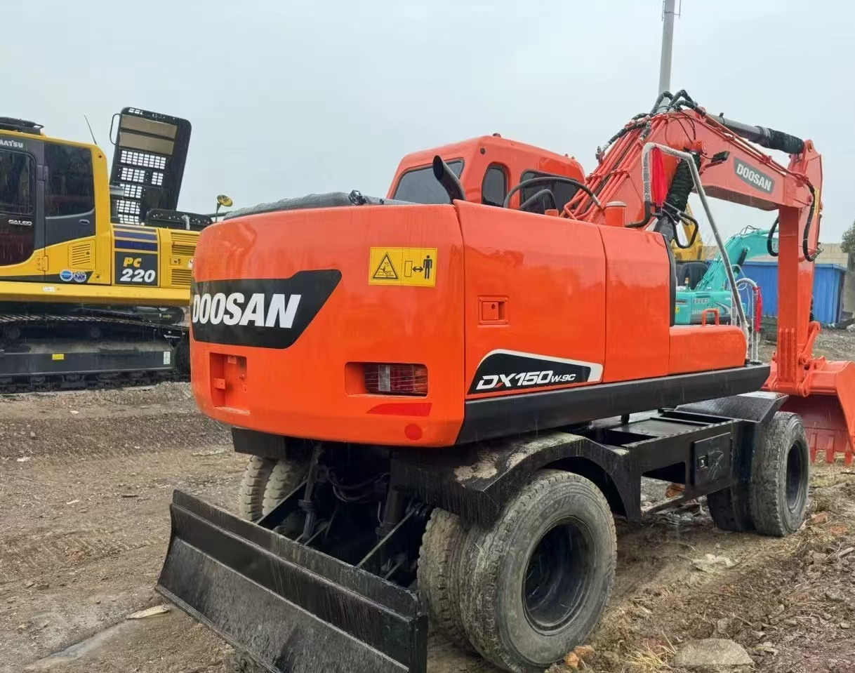 DOOSAN DX150W Wheel Excavator Good Condition - Riteņu ekskavators: foto 1 DOOSAN DX150W Wheel Excavator Good Condition - Riteņu ekskavators: foto 1