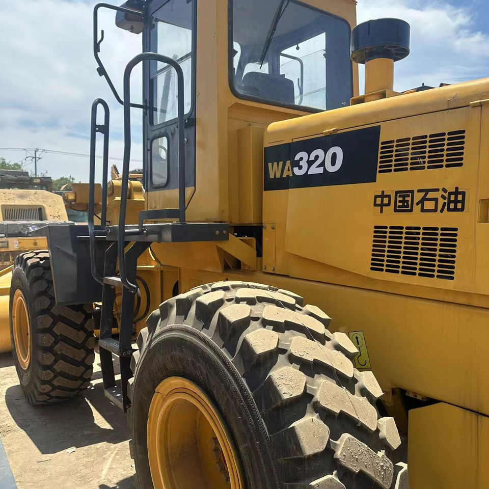 KOMATSU WA320 Wheel Loader Click for Discount - Riteņu iekrāvējs: foto 2 KOMATSU WA320 Wheel Loader Click for Discount - Riteņu iekrāvējs: foto 2