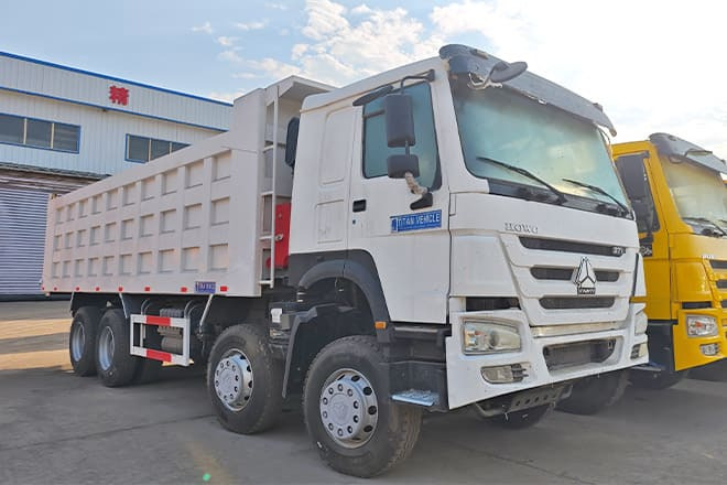 SINOTRUK Sino Howo 8x4 Dump Truck 371 for Sale in Sierra Leone - Kravas automašīna pašizgāzējs: foto 4 SINOTRUK Sino Howo 8x4 Dump Truck 371 for Sale in Sierra Leone - Kravas automašīna pašizgāzējs: foto 4