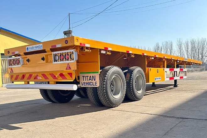 TITAN 2 Axle 40 Ft Flatbed Trailer for Sale in Uganda - Bortu puspiekabe/ Platforma: foto 3 TITAN 2 Axle 40 Ft Flatbed Trailer for Sale in Uganda - Bortu puspiekabe/ Platforma: foto 3