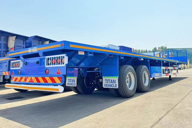TITAN 2 Axle 45 Ft Flatbed Trailers for Sale in Algeria - Bortu puspiekabe/ Platforma: foto 4 TITAN 2 Axle 45 Ft Flatbed Trailers for Sale in Algeria - Bortu puspiekabe/ Platforma: foto 4