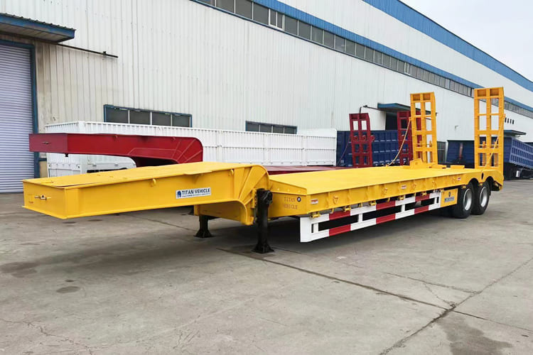 TITAN 2 Axle Low Bed Trailer for Sale in Guyana - Puspiekabe zema profila platforma: foto 1 TITAN 2 Axle Low Bed Trailer for Sale in Guyana - Puspiekabe zema profila platforma: foto 1