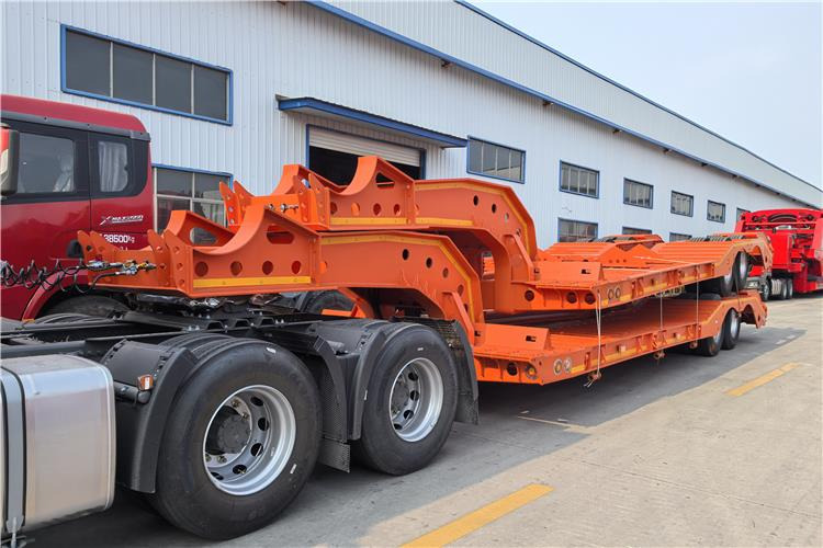 TITAN 2 Axle Low Low Bed Trailer for Sale In Angola - Puspiekabe zema profila platforma: foto 1 TITAN 2 Axle Low Low Bed Trailer for Sale In Angola - Puspiekabe zema profila platforma: foto 1