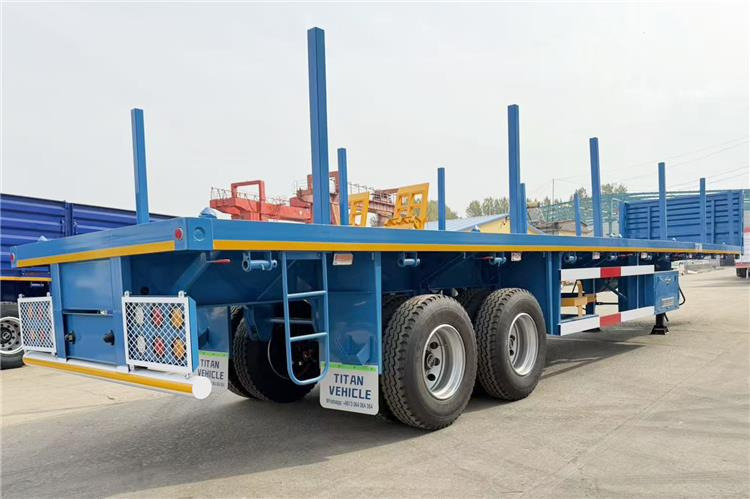 TITAN 2 Axle Wood Log Trailer Flatbed Trailer for Sale In Zimbabwe - Bortu puspiekabe/ Platforma: foto 1 TITAN 2 Axle Wood Log Trailer Flatbed Trailer for Sale In Zimbabwe - Bortu puspiekabe/ Platforma: foto 1