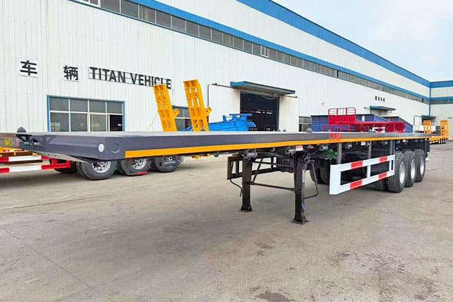 TITAN 3 Axle Flatbed Semi Trailer for Sale in Ghana - Bortu puspiekabe/ Platforma: foto 1 TITAN 3 Axle Flatbed Semi Trailer for Sale in Ghana - Bortu puspiekabe/ Platforma: foto 1