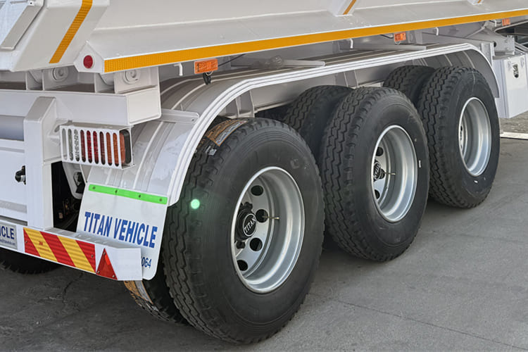 TITAN 3 Axle Tipper Trailer for Sale in Tanzania - Puspiekabe pašizgāzējs: foto 4 TITAN 3 Axle Tipper Trailer for Sale in Tanzania - Puspiekabe pašizgāzējs: foto 4