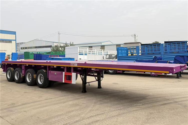 TITAN 4 Axle 40ft Flatbed Semi Trailer for Sale In Guam - Bortu puspiekabe/ Platforma: foto 5 TITAN 4 Axle 40ft Flatbed Semi Trailer for Sale In Guam - Bortu puspiekabe/ Platforma: foto 5